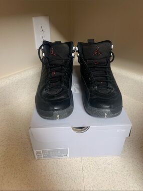 Jordan Black Sneakers with Red Jumpman Accents